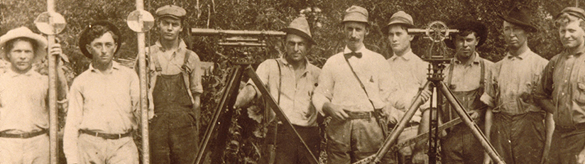 historical surveyors with their equipment