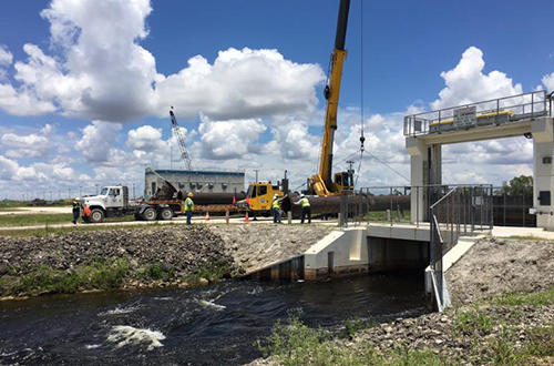 photo of temporary pumps being installed at S-176 structures