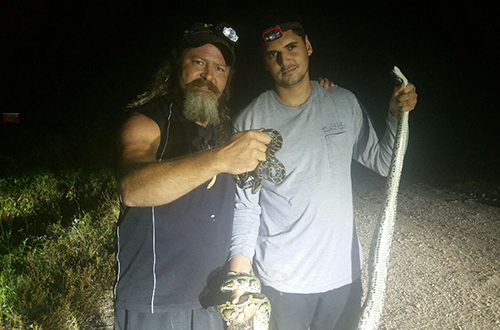 photo of Jason Leon with the 500th python eliminated