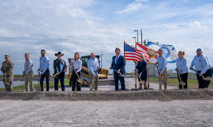 Breaking ground with shovels