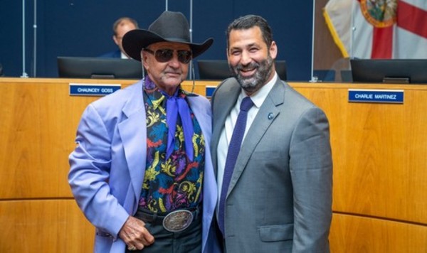 two men standing near podium