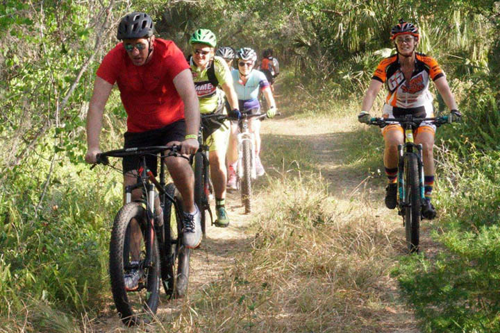 Group of people riding bicycles