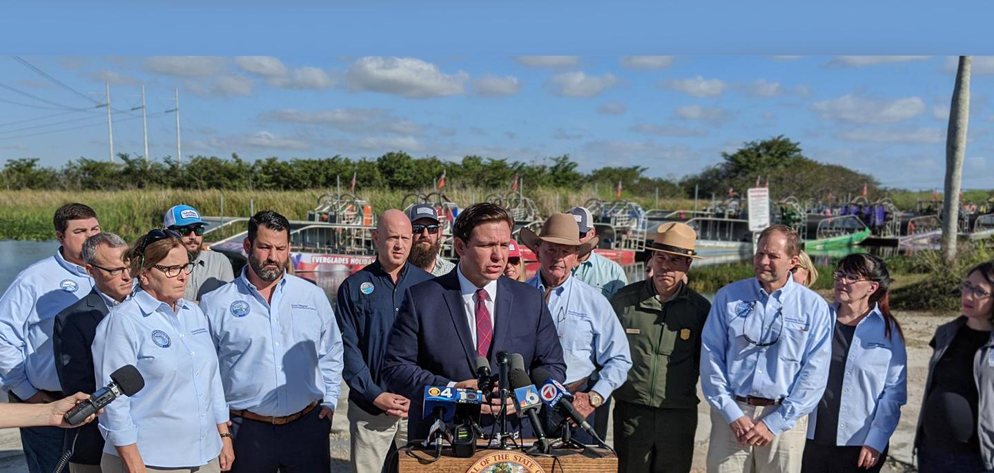 governor standing at podium