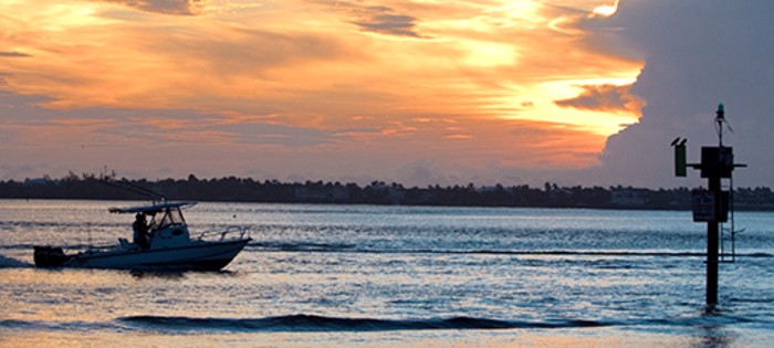 boat traveling through chan